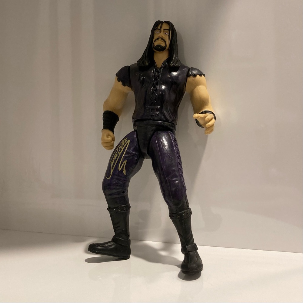 WWF/WWE 1997 Jakks Pacific Inc.
Titan Sports Inc. The Undertaker Action Figure